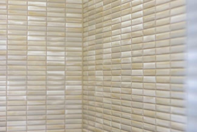 Mozaiek wand badkamer