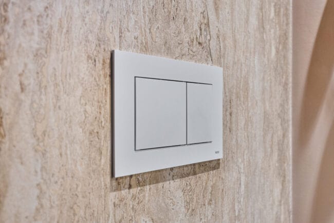 Spoelknoppen toilet Loomans Tegelwerken